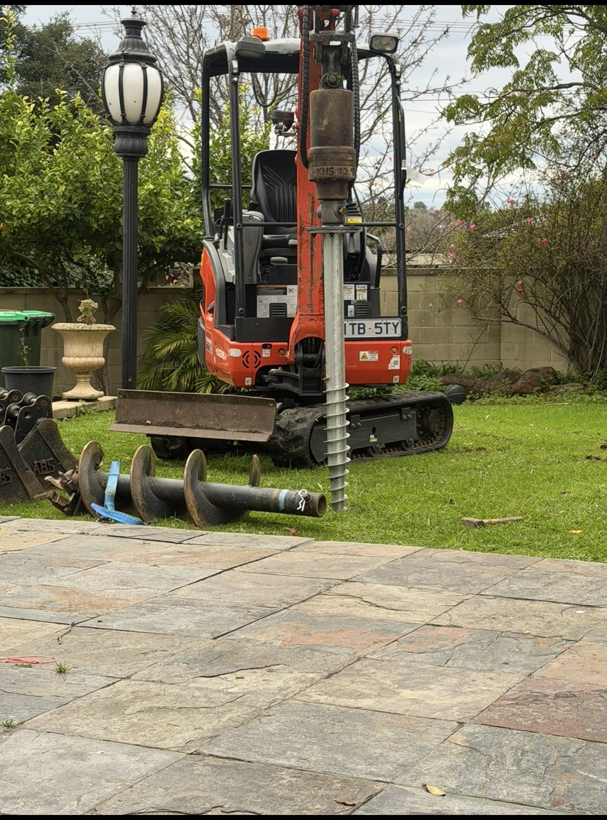 Auger drive unit for screw pile installation