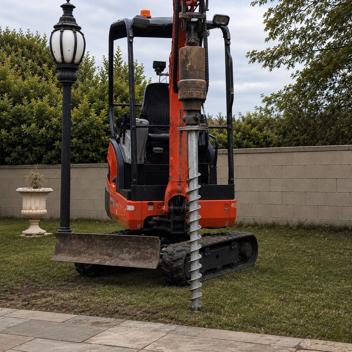 Auger drive attachment fitted to excavator